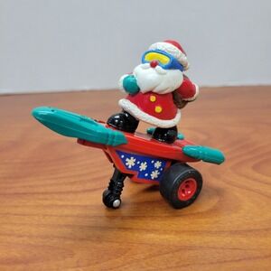 Russ Vintage Push Up‎ Santa Claus on a Rocket